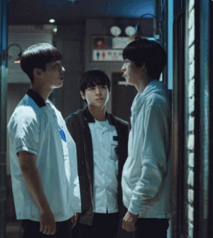 "Screenshot from Weak Hero Class 1 showing Choi Hyun-wook as Ahn Su-ho and Hong Kyung as Oh Beom-seok in a heated physical altercation inside a karaoke room, depicting the violent breakdown of their relationship."